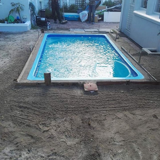 Re-marbelited pool, filled and running